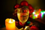 Two Glasses Of Champagne With A Christmas Decor In The Background Stock Photo