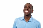 Handsome Man Smiling And Looking Away Stock Photo