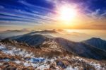 Winter Landscape With Sunset And Foggy In Deogyusan Mountains, South Korea Stock Photo