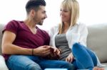 Beautiful Young Couple In Love At Home Stock Photo