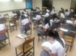 Blur Background University Students Writing Answer Doing Exam In Stock Photo