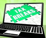 Tax Breaks On Laptop Shows Internet Paying Stock Photo