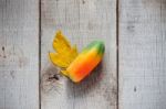 Papaya And Leaves On Wooden Stock Photo