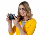 Female Photographer With A Camera Stock Photo