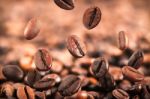 Flying Coffee Beans Stock Photo