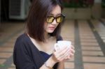 Portrait Of Thai Adult Glasses Beautiful Girl Drinking Coffee Stock Photo