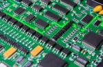 Circuit Board With Electronic Components Background Stock Photo