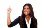 Corporate Lady Pointing Upwards Stock Photo