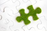 Green Puzzle Piece Stock Photo