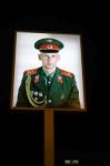 Illuminated Photograph Of A Soviet Soldier At Checkpoint Charlie Stock Photo