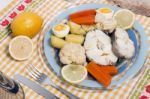 Hake Fish With Cauliflower And Potatoes Stock Photo