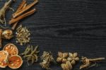 Dried Herbs And Ginseng, Top View Of Thai Herbs And Ginseng On Wooden Floor Stock Photo