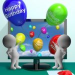 Balloons Greeting From Computer Celebrates Happy Birthday Stock Photo