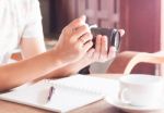 Woman With Camera In The Hands Stock Photo