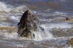 Rocks Pounded By The Sea At Hope Gap Stock Photo