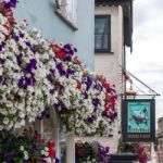 Windsor, Maidenhead & Windsor/uk - July 22 : Hanging Baskets Lad Stock Photo