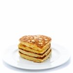 Pile Of Heart Shaped Pancakes On White Plate Stock Photo