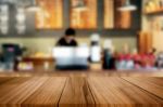 Selected Focus Empty Brown Wooden Table And Coffee Shop Or Resta Stock Photo