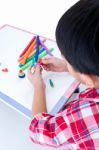 Child Moulding Whale Modeling Clay, On White Background. Strengt Stock Photo