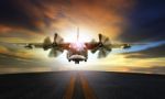 Old Military Plane Approaching To Landing On Airport Runway Stock Photo