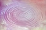 Abstract Pink Circle Water Drop Ripple With Wave, Texture Backgr Stock Photo