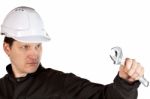 Handyman Wearing Uniform And Hardhat Stock Photo