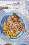 Turkey Steak With French Fries Stock Photo