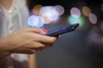 Woman Use Of Cellphone At Outdoor Stock Photo