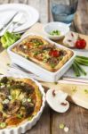 Quiche Lorraine With Chicken, Mushrooms And Broccoli Stock Photo