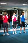 Group Of People Doing Biceps Exercise Stock Photo