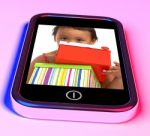 Girl Holding Gift Box On Screen Stock Photo