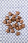 Chocolate Hearts On Fabric Stock Photo