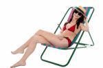 Young Bikini Woman Relaxing On Deckchair Stock Photo