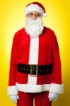 Isolated Aged Male Dresses In Santa Attire Stock Photo