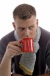 Young Man Drinking Coffee Stock Photo