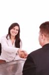 Handshaking Business People Stock Photo