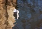 Paper Boat Floating In The Creek Stock Photo