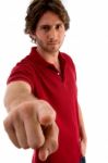 Young Male Pointing Forward Stock Photo