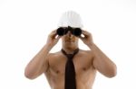 Muscular Architect Looking Through Binocular Stock Photo