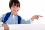 Happy Young Boy Pointing To Copy Sapce Stock Photo