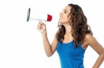 Smiling Woman With Megaphone Isolated On White Stock Photo