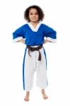 Young Confident Karate Kid Posing Stock Photo