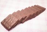 Stack Of Milk Chocolate Pieces Stock Photo