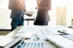 Close-up Of Office Desk With Business Team Discussting Work Proj Stock Photo