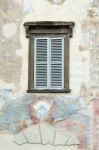 Old Faded Mural On A Wall In Citta Alta Bergamo Stock Photo