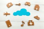 Cardboard Web Icons  And Blue Cloud On Blue Background Stock Photo