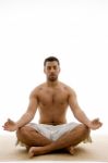 Man Doing Yoga Stock Photo