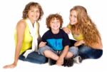 Family Having Fun On The Floor Stock Photo