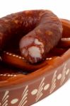 Traditional Portuguese Pottery For Grilling Chorizos Stock Photo