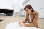 Portrait Of Thai Adult Businesswoman Beautiful Girl Using Her Smart Phone Stock Photo